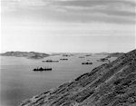 Enterprise CV-6 and other US fleet ships in Noumea Harbor, New Caledonia, 5 November 1942.