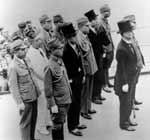 The Japanese surrender delegation aboard USS Missouri BB-63 in Tokyo Bay, 2 September 1945.