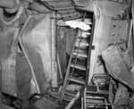 Bomb damage to compartment A-306, officers' quarters, in Enterprise, 26 October 1942.