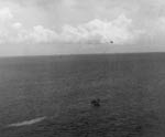 A Vought OS2U Kingfisher picks up two US Navy airmen downed off Truk, 30 April 1944.