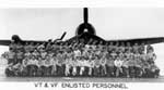 Night Air Group 90 enlisted personnel, in front of a radar equipped F6F-5(N) Hellcat fighter.