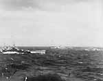 North Carolina BB-55, Yorktown CV-10, and other ships of Task Force 38 in heavy seas, 7 Nov. 1944.