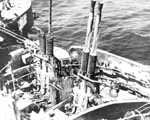 Damaged 40mm gun mount forward of Enterprise CV-6's island, 20 March 1945.