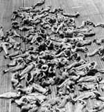 Flight deck crews on Enterprise CV-6 catch up on sleep, November 1942.