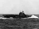 Hornet CV-8 ploughs through heavy seas just prior to launching the Doolittle Raid, 18 April 1942.