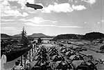 Enterprise CV-6 and Washington BB-56 in the Miraflores Locks, Panama Canal, 11 October 1945.