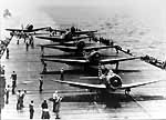 Enterprise CV-6 planes prepare for launch as she heads for the Coral Sea, 4 May 1942.