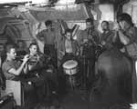 The Hellcats jamming in a squadron ready room, late 1942 or early 1943.