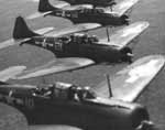 Douglas SBD Dauntless dive bombers in extended formation.