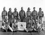 Torpedo Squadron Ten officers with insignia on Enterprise CV-6's flight deck, 7 February 1943.