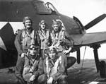 Night Air Group 90 pilots pose before a night fighter aboard Enterprise CV-6, 1945.