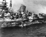 Close-in view of port side of the Japanese cruiser Mikuma, 6 June 1942.