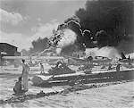 Wreckage at Ford Island Naval Air Station, Pearl Harbor, Territory of Hawaii, 7 December 1941.