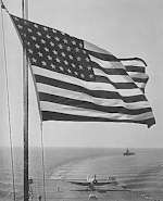 Stars and Stripes over Enterprise CV-6 in November 1942.