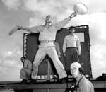 Landing Signal Officer (LSO) ENS Robert H. Grant at work, March 1945.