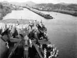 Enterprise CV-6 approaches locks in the Panama Canal, as she transits to the Atlantic, October 1945.