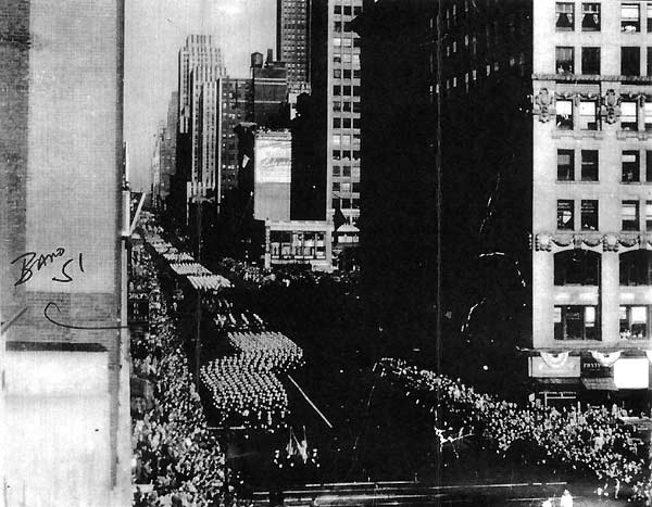 Enterprise's Band 51, led by Bugler Jack Banks, marches in New York's Navy Day parade.