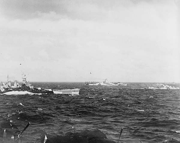 North Carolina BB-55, Yorktown CV-10, and other ships of Task Force 38 in heavy seas, 7 Nov. 1944.