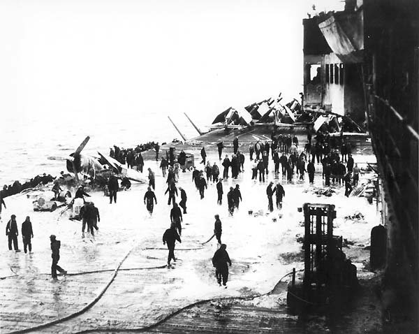 Fire-fighting foam covers Enterprise CV-6's flight deck following enemy attack, 20 March 1945.