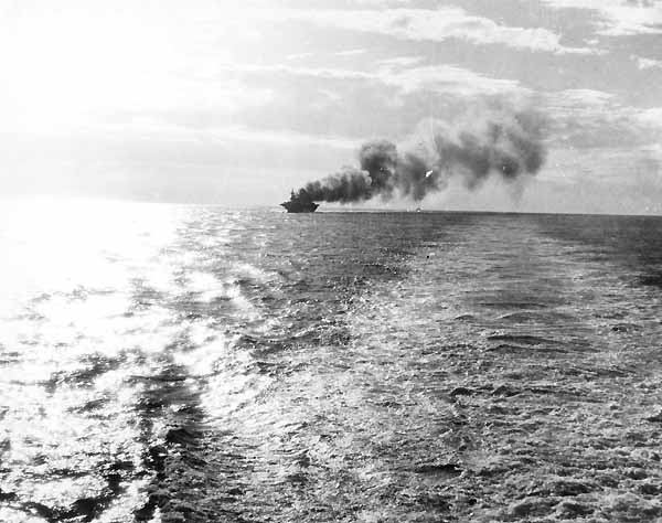 Fuel and ammunition burn aboard Enterprise CV-6 following a "friendly" fire hit, 20 March 1945.