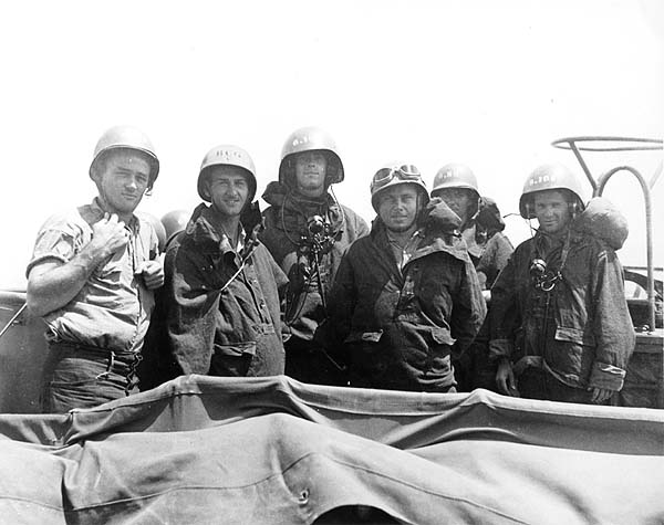 Lookouts relax during a break in the action: Naval Battle of Guadalcanal, 13 November 1942.