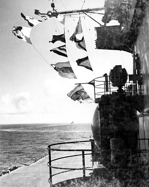 Signal flags flutter from Enterprise CV-6's bridge, 13 November 1942.