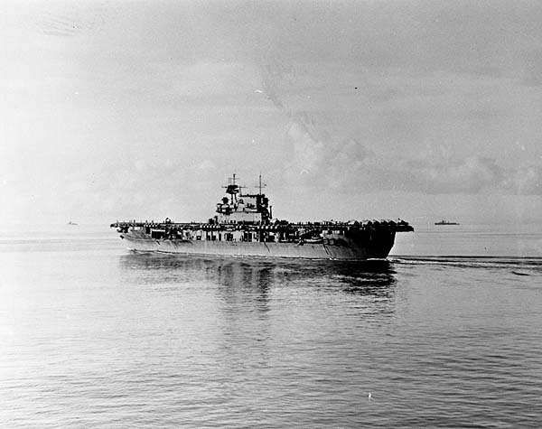 Enterprise CV-6 eases through calm seas, near Espiritu Santo, 13 April 1943.