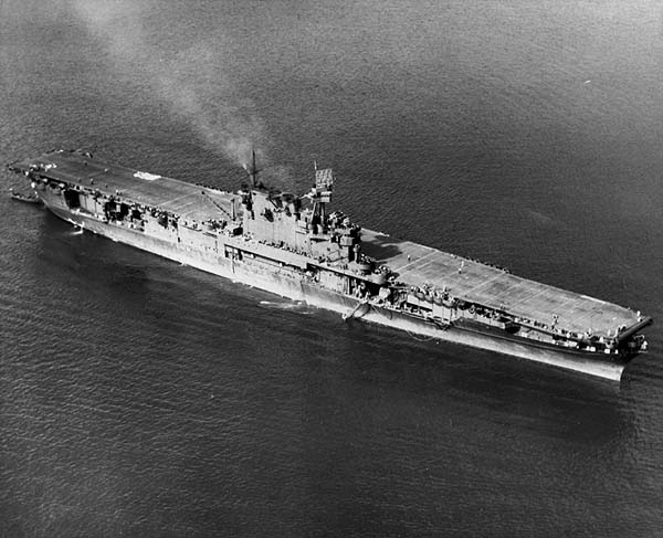 Fine aerial view of Enterprise CV-6 at Noumea, New Caledonia, about November 1942.