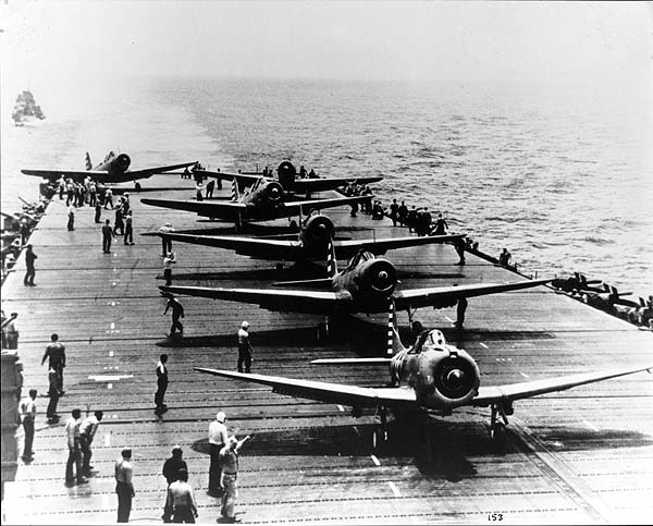 Enterprise CV-6 planes prepare for launch as she heads for the Coral Sea, 4 May 1942.