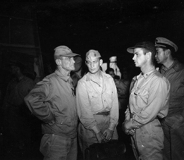 Admiral Marc Mitscher (left) and staff on Enterprise CV-6, 11 May 1945.