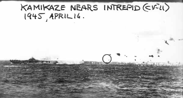 Kamikaze (circled) nears Intrepid CV-11, 16 April 1945.