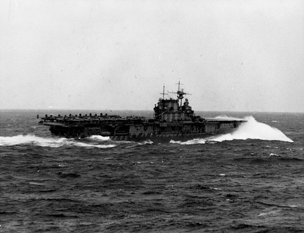 Hornet CV-8 ploughs through heavy seas just prior to launching the Doolittle Raid, 18 April 1942.