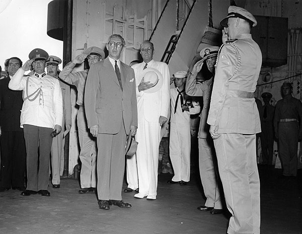 Officers onboard Enterprise CV-6 receive Chilean officials and dignitaries, 9 October 1945.