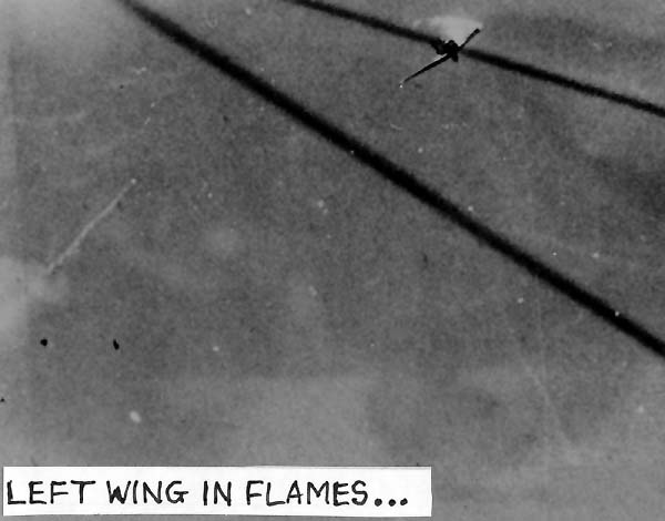 Kamikaze hurtles toward Enterprise CV-6, but left wing has been set afire.