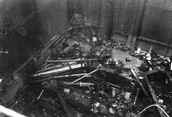 Detail of below deck damage in Enterprise CV-6, following Kamikaze hit, 14 May 1945.