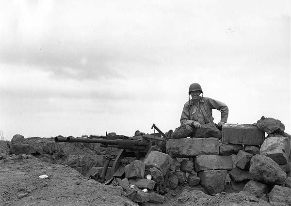 Iwo Jima scene, photographed by party visiting from Enterprise CV-6, 9 March 1945.