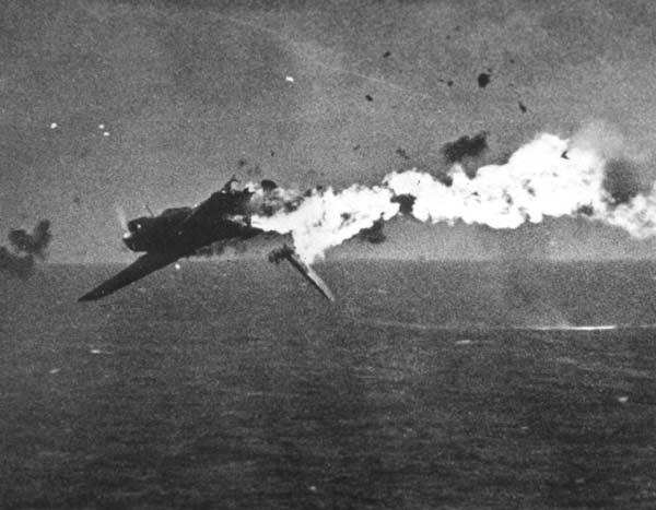 Anti-aircraft fire disintegrates a Japanese 'Kate' torpedo bomber, 4 December 1943.