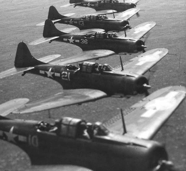 Douglas SBD Dauntless dive bombers in extended formation.