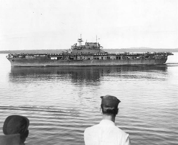 Enterprise CV-6 underway from Espiritu Santo's berth CV-1, 13 April 1943.