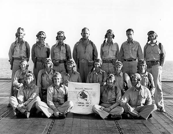 Torpedo Squadron Ten officers with insignia on Enterprise CV-6's flight deck, 7 February 1943.