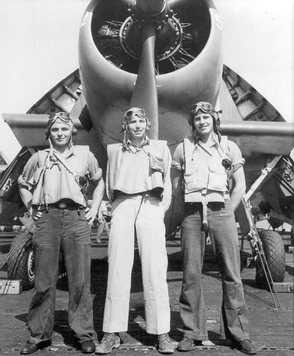 LT(jg) Charles E. Henderson (center) and his VT-10 air crew, in spring 1944.