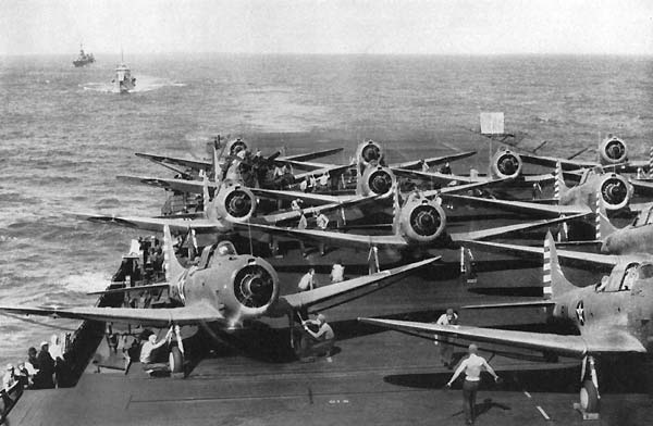 Bombing Six SBD-2s warm up on Enterprise's flight deck, preparing to strike Wake Island.