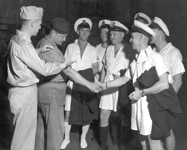 Enterprise men greet performers from HMNZS Leander after the show, 21 April 1943.