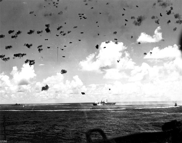 Enterprise CV-6 is straddled by near misses during a dive-bomber attack, 26 October 1942.