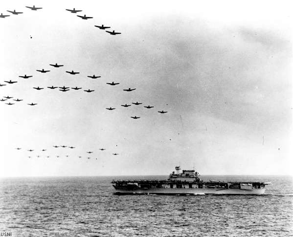 Planes from Enterprise CV-6 overfly her in formation, some time in 1941.